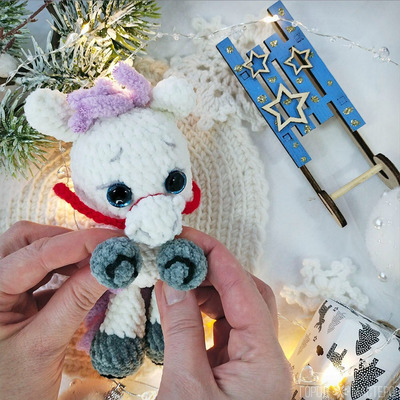 Белая лошадка